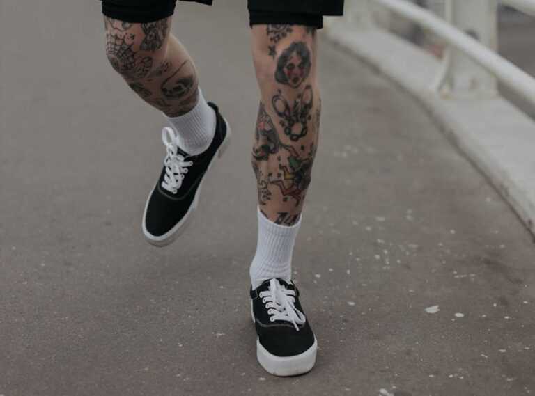 gangster chicano leg tattoos